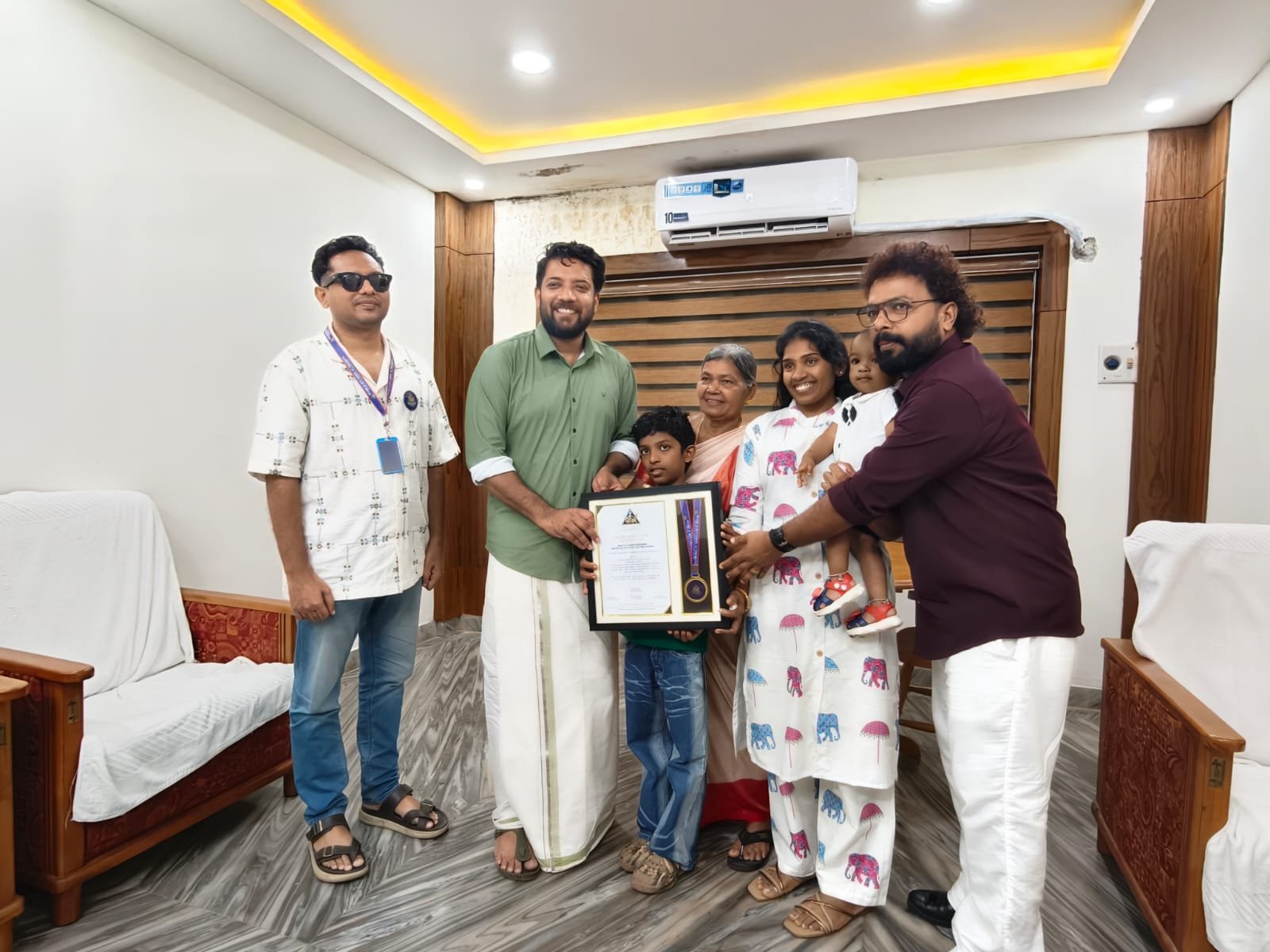World Records Authority officials with the record holder