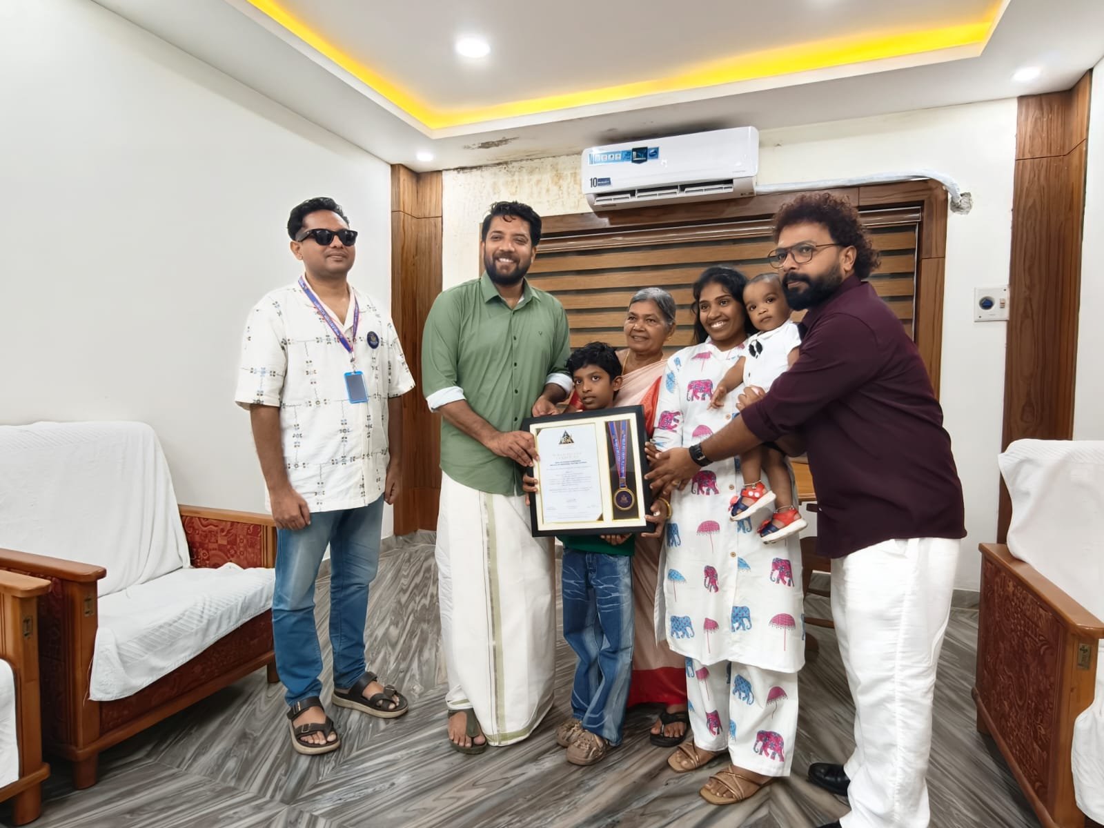 The family celebrates the world record certification